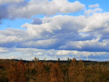 Panoramic view of field against sky