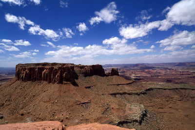 Rock formations in desert against sky