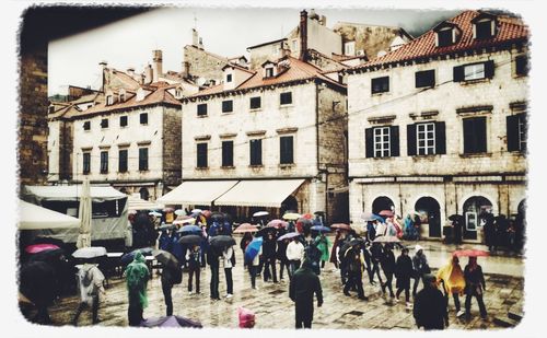 People in front of building