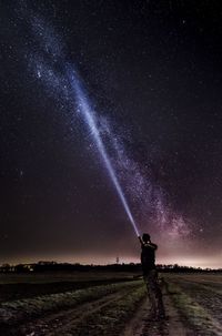 Scenic view of star field against sky at night