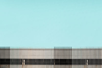 Low angle view of building against clear blue sky