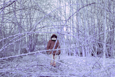 Man walk on snow covered land in end of days