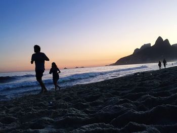 Scenic view of sea at sunset