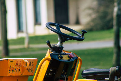 Close-up of bicycle on field