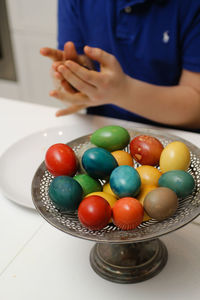 High angle view of multi colored easter eggs on table