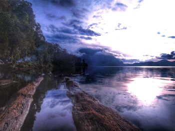 View of lake against cloudy sky