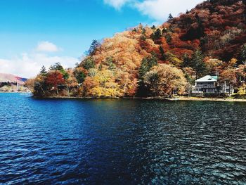 Scenic view of lake against sky during autumn