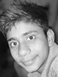 Close-up portrait of smiling boy