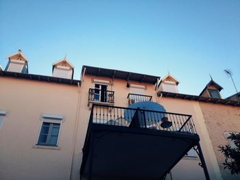 Low angle view of building against blue sky