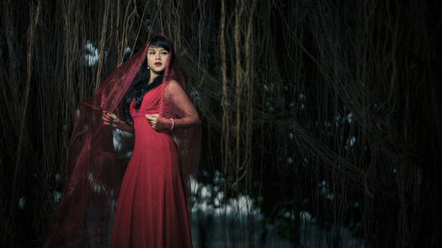 Portrait of a young woman in forest