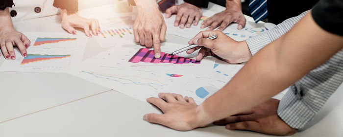 High angle view of people with hands