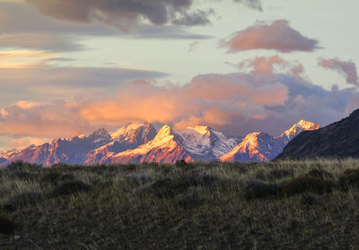 Scenic view of mountains against sky during sunset