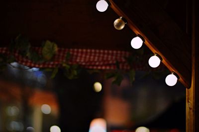 Low angle view of illuminated light bulb