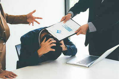 People working on laptop