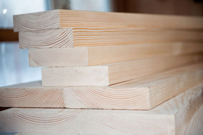 Close-up of stacked wooden planks