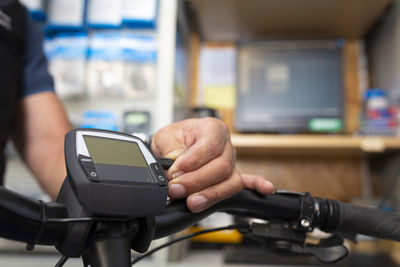 Close-up of man using mobile phone