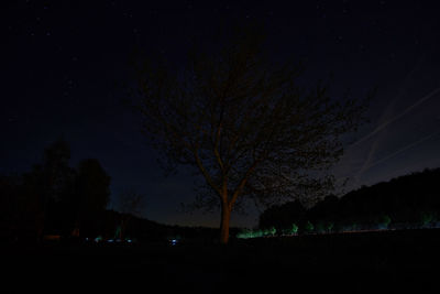 Scenic view of landscape against sky at night