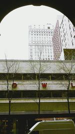 View of buildings through window