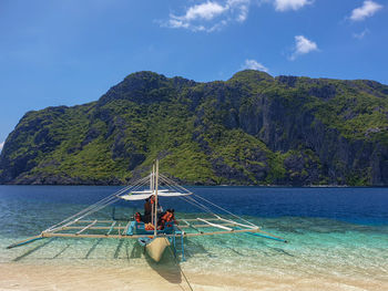 Scenic view of sea against mountain