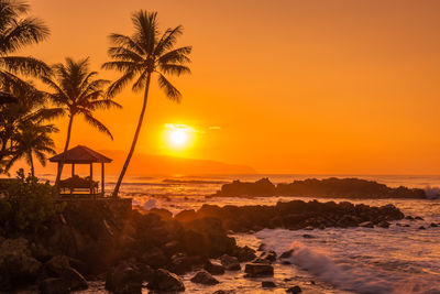 Scenic view of beach during sunset