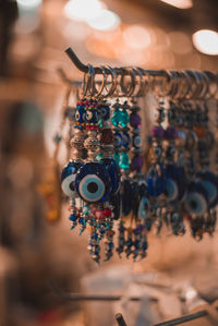 Close-up of decoration hanging for sale in market