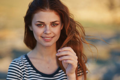 Portrait of smiling young woman