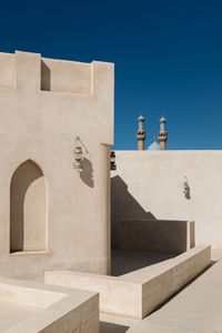 Low angle view of building against blue sky