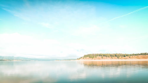 Scenic view of lake against sky, yellowstone wyoming