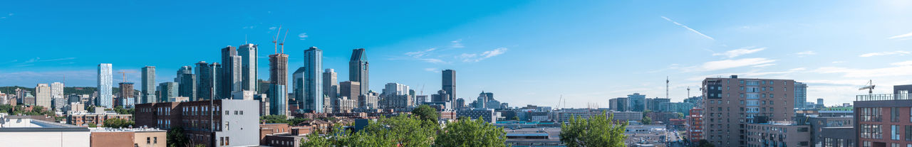 Panoramic view of buildings against sky