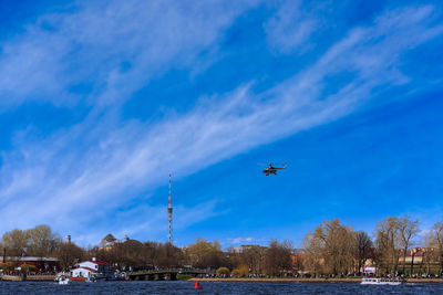 Airplane flying over blue sky