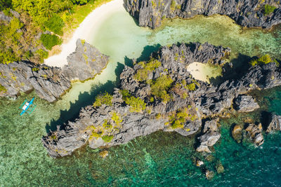 High angle view of rock by lake