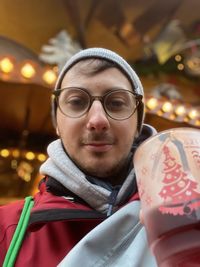 Portrait of young woman wearing sunglasses