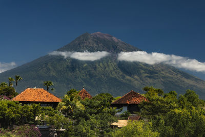 Peak of mount agung volcano above the amed village in karangasem, bali, indonesia