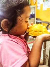 Close-up of woman eating food