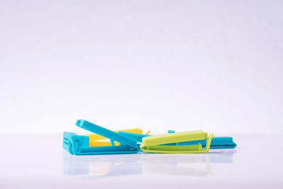 Close-up of toy over white background