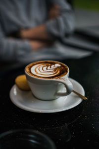 Coffee cup on table