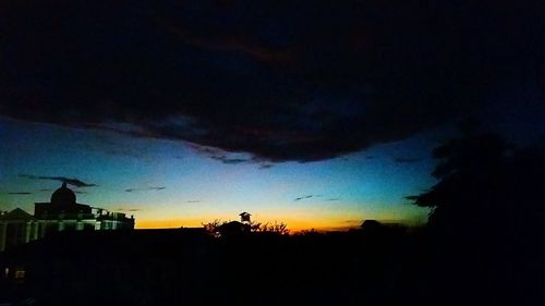 Low angle view of cloudy sky at dusk