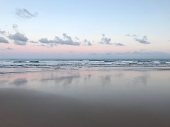 Scenic view of sea against sky at sunset