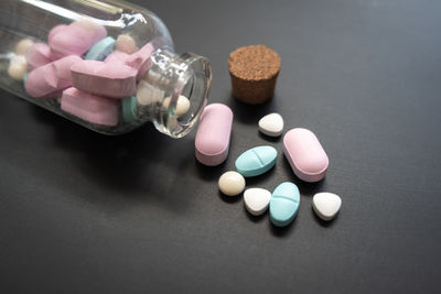 High angle view of multi colored candies on table