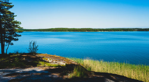 Scenic view to sea against sky