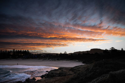 Scenic view of silhouette landscape against sky during sunset