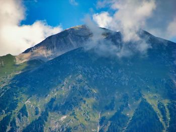 Aerial view of mountains against sky