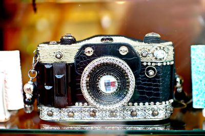 Close-up of camera on table