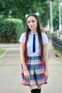 Asian high school girl on a walk.