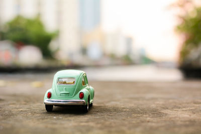 Close-up of toy car on road