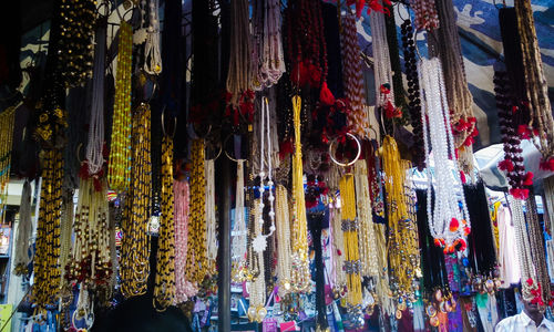 Close-up of multi colored accessories for sale in market