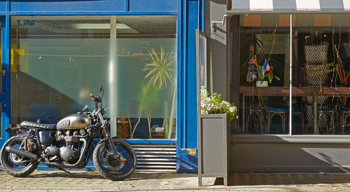 Bicycles in street against building