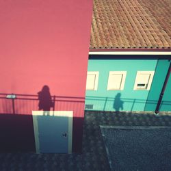 Man in front of building