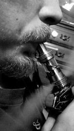 Close-up of man working in factory