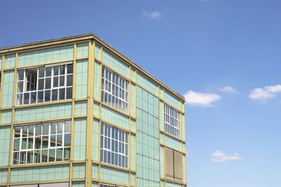 Low angle view of modern building against sky